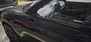 auto con robo parcial del espejo lateral